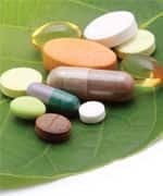 vitamins, tablets, pill and green leaf