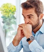 Man clutching his heart