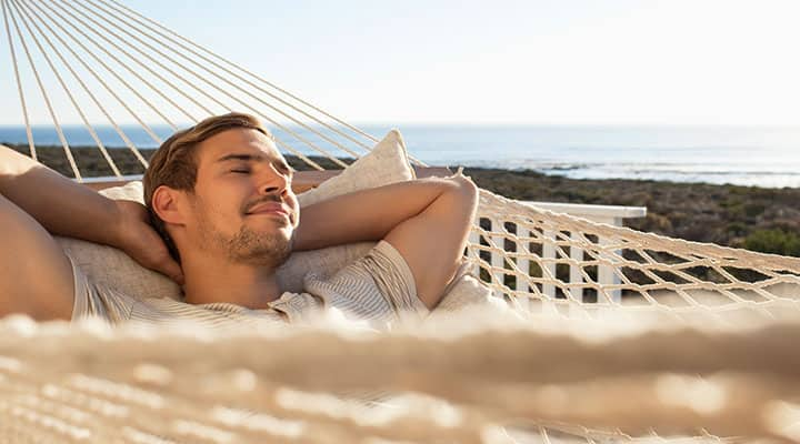 Adult enjoying restful sleep on vacation