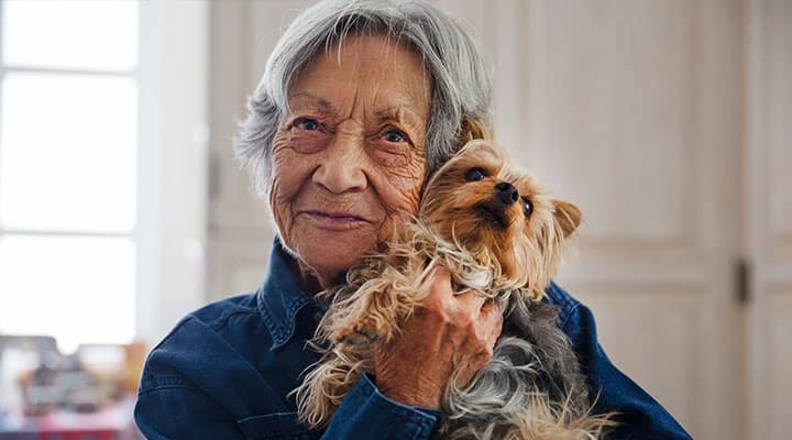 Elderly woman with her dog