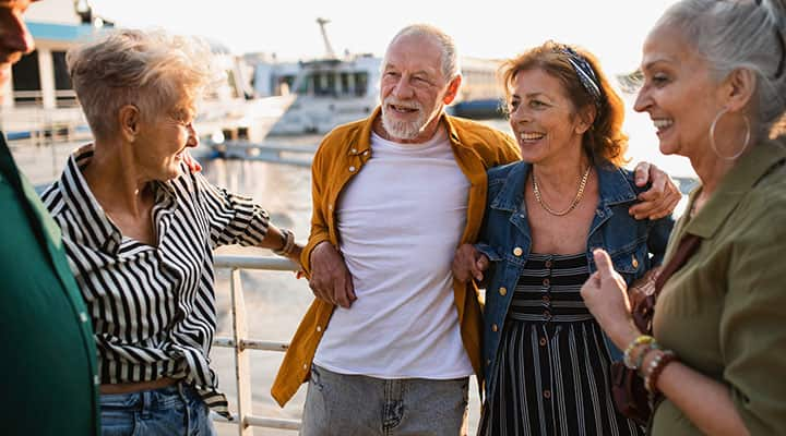 Seniors enjoying each others’ company outdoors