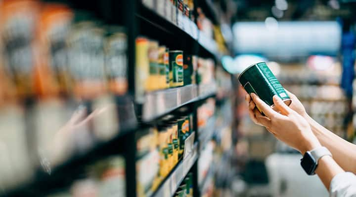 Checking the label for excessive salt in canned food