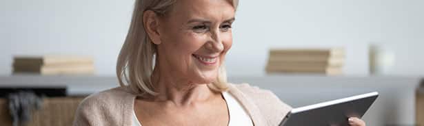 Mature woman checking out her wellbeing lab results