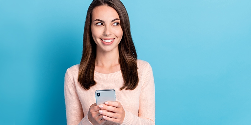women looking at a phone