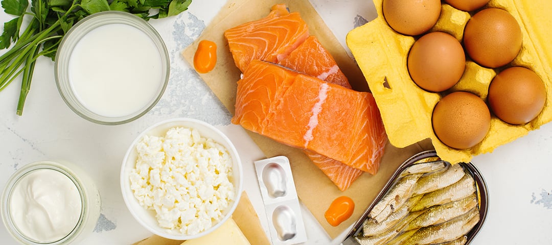 Salmon, eggs and other foods spread out on table