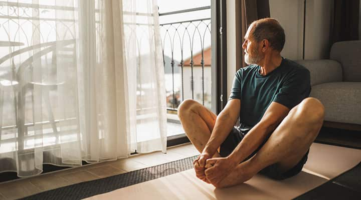 Man performing cozy cardio for a low impact cardio exercise