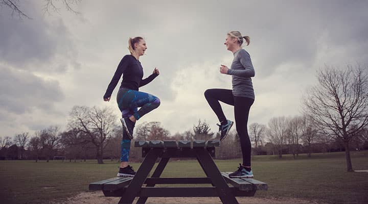 Two woman doing good for the glutes step ups