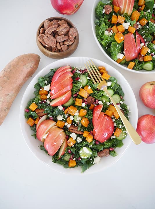 Pecans add crunch to an Apple Pomegranate Harvest Salad.