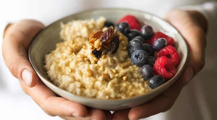 Bowl with mixed oats, bananas and nuts