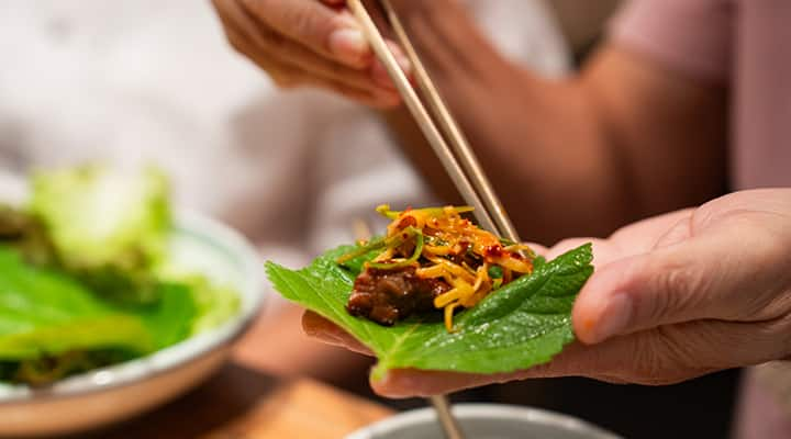 Spicy carrot kimchi can be enjoyed as a side dish or added to salads and wraps