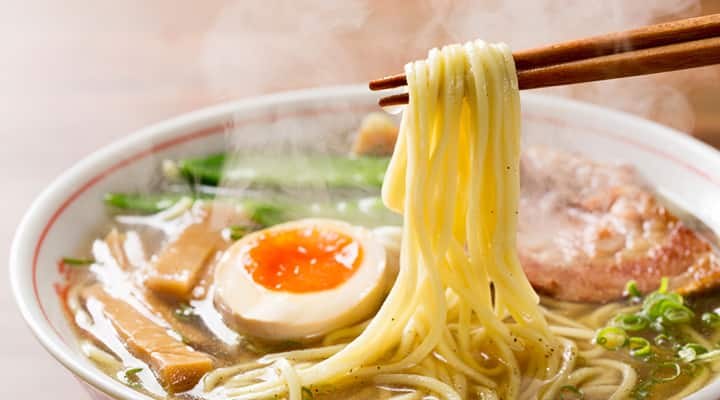 Soft-boiled egg in a bowl of hot ramen