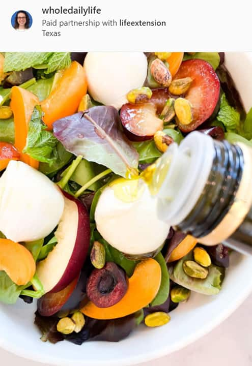 Vinaigrette with extra virgin olive oil poured over fresh salad