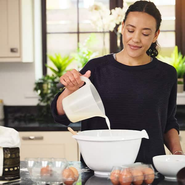 After adding the milk, stir the batter until lumps are removed