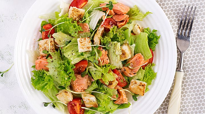 Caesar salad with salmon