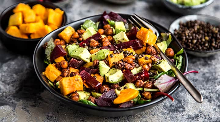 Salad packed with lentils and avocado cubes that are high in potassium