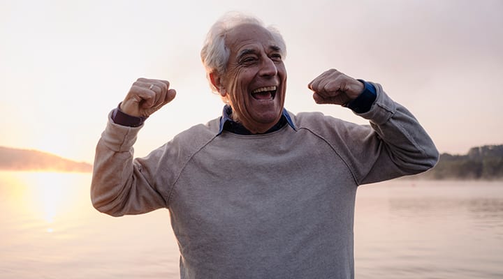 Man smiling and flexing