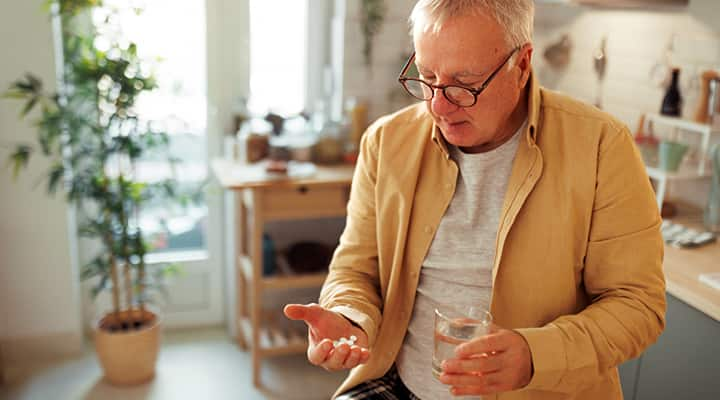 Man taking semaglutide tablet