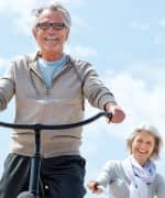 Man and woman riding bicycles