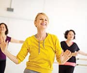 Smiling woman at a dance class