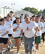 McConaughey running with students from foundation