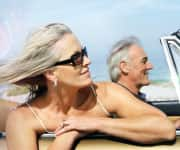 Older couple in car enjoying NAD+ benefits