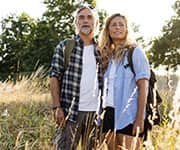 Couple outside during a hike reducing cortisol levels