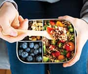 Meal tin filled with fruits and vegetables with phytonutrients