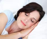 Woman sleeping with the help from melatonin