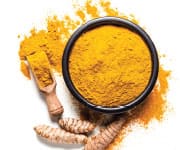 Bowl of curcumin powder a rich source of curcuminoids