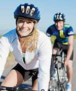 Woman and man biking being supported by increased DHEA levels