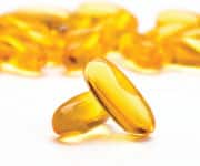 Fish oil capsules being used for optimal triglyceride control