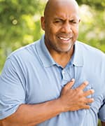 Matured man holding chest due to cardiovascular pain that can lead to death