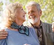 Senior couple laughing together with longer life expectancy