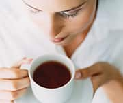 Woman drinking black tea for bioactive compounds