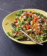 Quinoa taco salad on a yellow plate