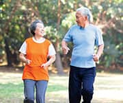 Older couple jogging for cardio health