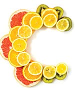 Letter C made up of citrus fruit slices for Vitamin C