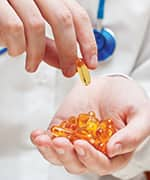 Doctor surveys omega-3 softgels for cancer intervention