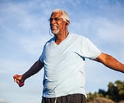 Man using resistance training to maintain lean body mass