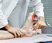 Physician testing for diabetic peripheral neuropathy using a tool