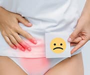 Woman dealing with urinary problems