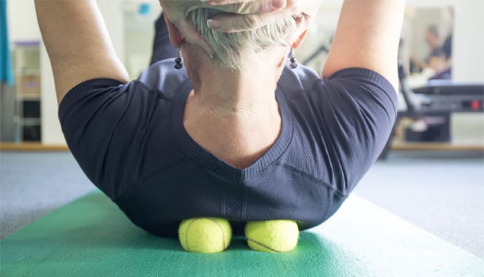 woman practicing self-massage